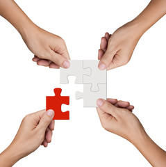 Hand holding jigsaw puzzles, Business partnership and teamwork concept - obrazy, fototapety, plakaty
