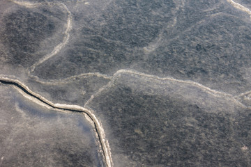 Fototapeta na wymiar River covered with ice.