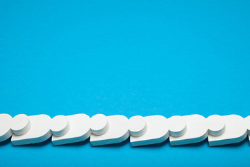 Domino effect, people figures in fault chain. Copy space for text.