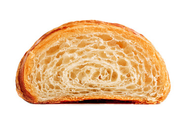 Croissant cut in a half. Homemade fresh golden croissant isolated on white background