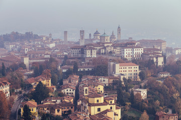 Obraz premium Aerial view of Bergamo in a foggy day, Italy.