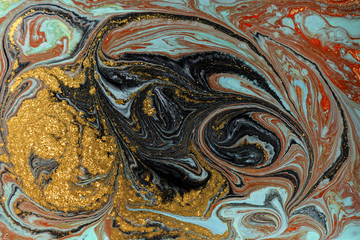Marble abstract acrylic background. Marbling artwork texture. Agate ripple pattern. Gold powder.