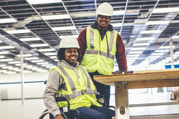 Portrait of smiling construction workers
