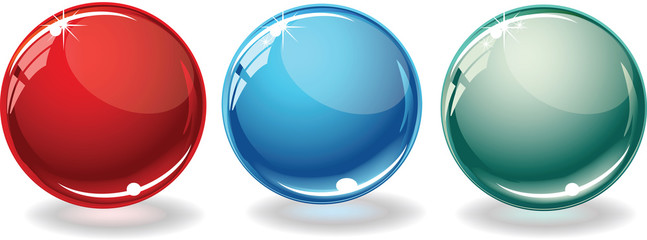 Colorful glass spheres. Blue, green and red colors.