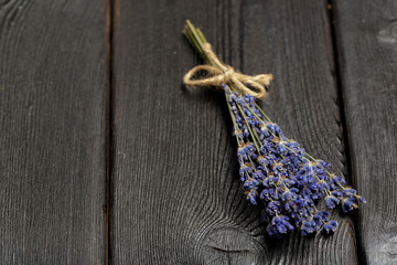 Bunch of dried lavender on wooden background