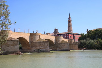 Fototapeta na wymiar Stone Bridge over Ebro in Zaragoza. Aragon, Spain