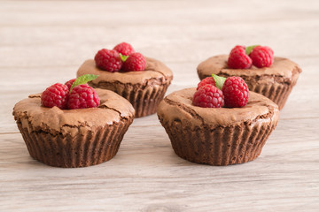 Delicious chocolate lava cakes with fresh raspberries and mint
