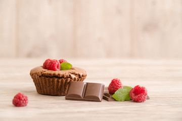 Delicious chocolate lava cake with fresh raspberries and mint