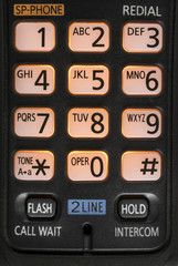 Modern Telephone Dial Pad Close up of a lighted dial pad of a tone telephone 