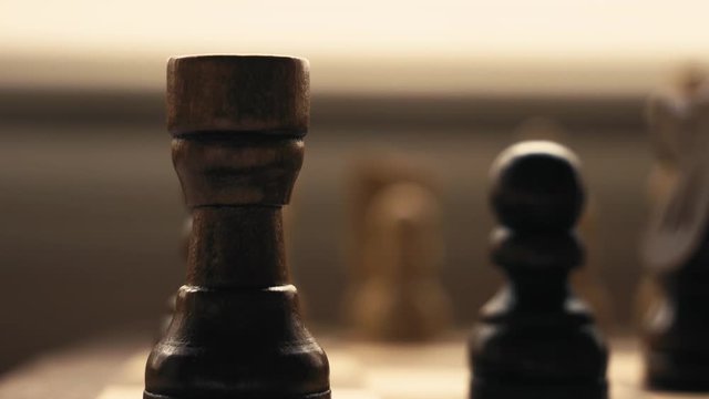 Black is moving its knight during a chess game.