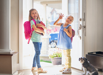Girls with backpack is going to school