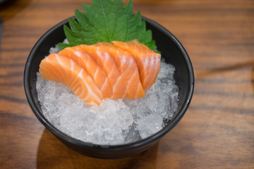 Raw salmon slice or salmon sashimi in Japanese style