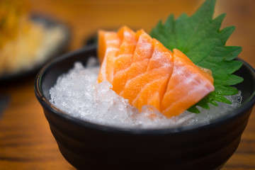 Raw salmon slice or salmon sashimi in Japanese style