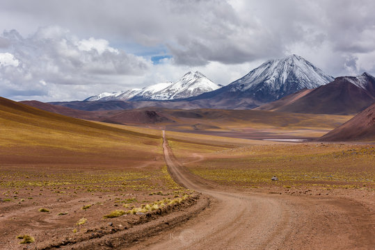 Road through Mountain landscape towards Lejla Lagoon, Socaire, El Loa, Antofagasta, Chile
