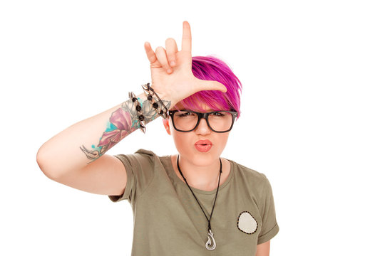 Provocative woman with rock and roll sign