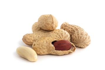 Dried peanuts on the white background.