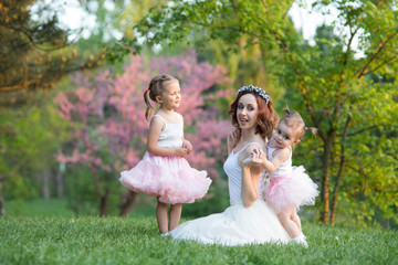 Fototapeta premium mom and two daughters