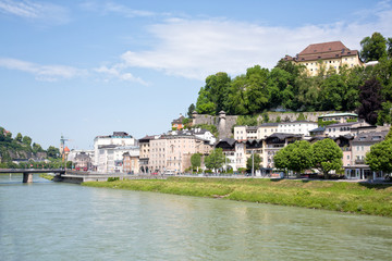 Fototapeta na wymiar Historic Salzburg seen from the Karolinen bridge over the Salzach river. 