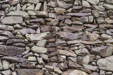 stones folded into the wall