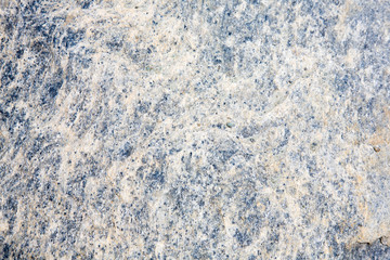Natural colorful granite rock stone wallpaper texture.