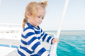 little boy at sea. marine trip od little boy. summer holiday of little boy. stylish little boy travel by sea. lets go with me.