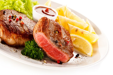 Grilled steaks and vegetables