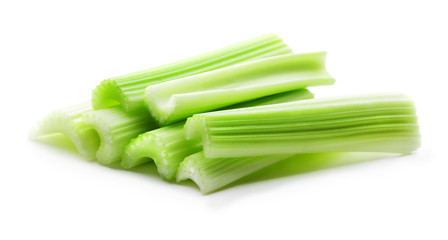heap of fresh green celery stiks isolated on white background