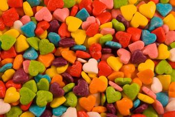 Fototapeta na wymiar sweet, colorful candies in the shape of a heart