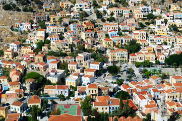 View traditional colorful houses island Symi.