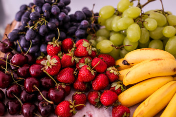 Fruits on a wooden plate