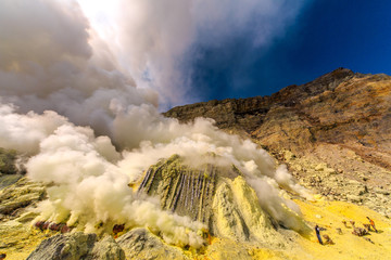 Toxic vappors of sulfur mining, Mount Ijen crater lake, East Java, Indonesia