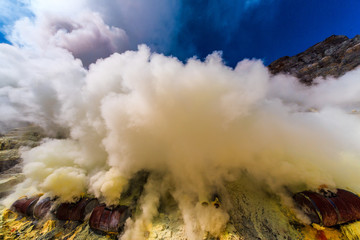 Toxic vappors of sulfur mining, Mount Ijen crater lake, East Java, Indonesia