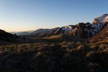 Mountains in the rays of the sun on a spring morning