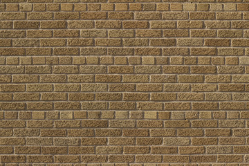 Vintage golden brown color brick wall background in Scottish bond pattern