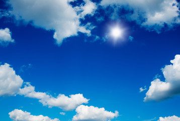 White clouds in blue sky.