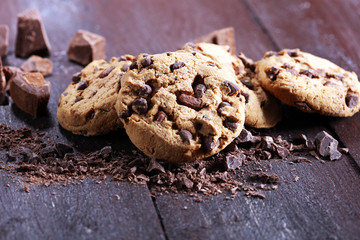 Chocolate cookies on table. Chocolate chip cookies shot with chocolate