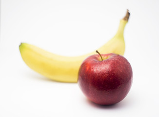 Banana and apple isolated background