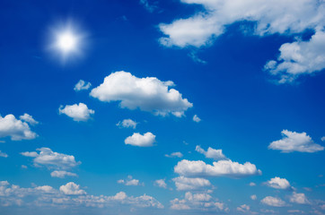 White clouds in blue sky.