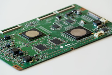Close up photo of circuit board on white background