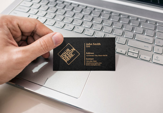 Man Holding Business Card Mockup