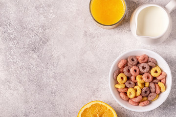 Colorful cereal rings in bowl.