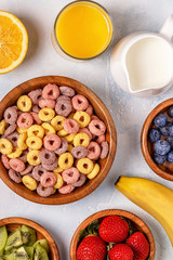Colorful cereal rings in bowl.