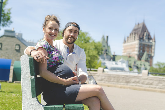 Pregnant Couple Portrait Outside In Quebec City