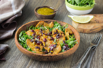 Salad with ruccola, grilled turkey or chicken, dried cranberries, pine nuts and citrus sauce. 