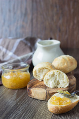 Buns rolls with jam and milk for breakfast