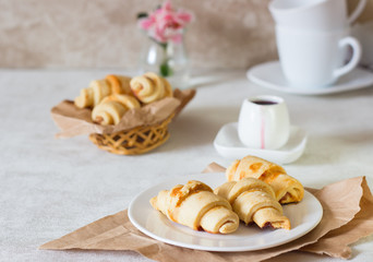 Red berry filling short crust pastry crescent rolls cookies. Jam rugelach (croissant), freshly baked sweet buns or bread rolls. Copy space for your text