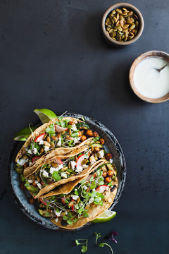 Vegetable tacos on blue background