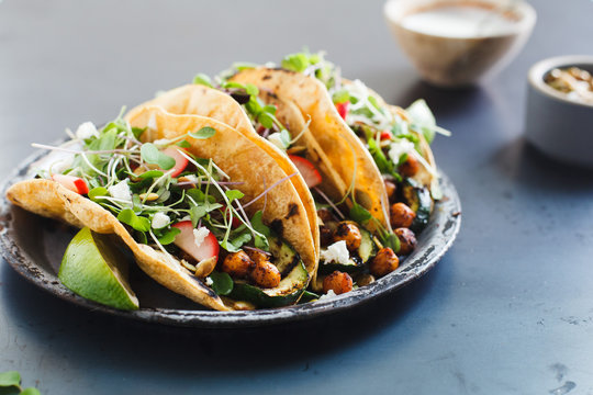 Vegetable tacos on blue background
