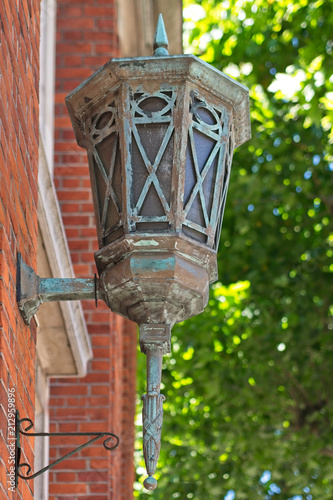 Closeup Of Vintage Victorian Style Lantern On The Brick Wall