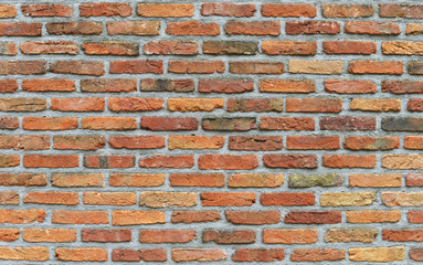 Old red block and concrete wall texture